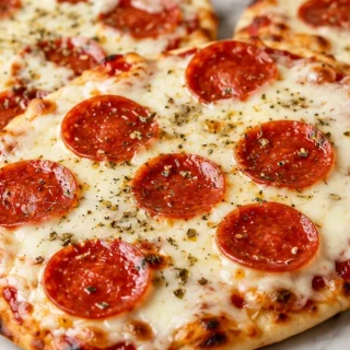 Easy Air Fryer Naan Pizza Recipe - air fryer pizza - Discover the ultimate easy Air Fryer Pizza recipe! Ready in just 10 minutes with crispy naan and melted che