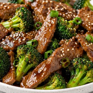 Air Fryer Beef & Broccoli: Quick & Easy Dinner - beef broccoli - Beef Broccoli Air Fryer: Make this easy stir-fry in just 15 minutes! Tender beef and crisp broc