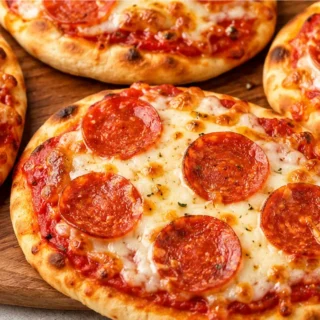 5-Min Air Fryer Naan Pizzas! Naan pizzas: Make quick and easy air fryer naan pizzas in under 15 minutes! Crispy, cheesy, and customizable for a perfect weeknigh
