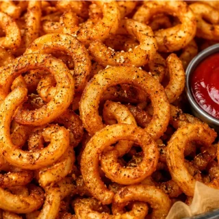 Crispy Air Fryer Curly Fries - Curly fries: Make the best crispy air fryer curly fries in under 15 minutes! Easy recipe for perfect golden fries every time. You