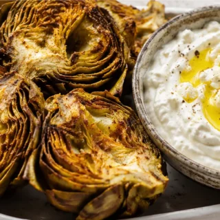 Crispy Air Fryer Artichokes with Feta Dip - Air fryer artichokes: master perfectly tender and crispy artichokes with a delicious feta yogurt dip. Quick, healthy