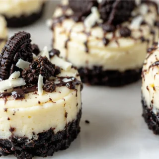 Air Fryer Mini Cheesecakes: Dream Bites! - air fryer cheesecake - Air fryer cheesecake: craft these creamy, perfectly portioned mini cheesecakes with an Oreo cr