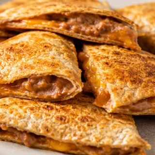 Crispy Air Fryer Tortilla Pillows! So Easy! Tortilla pillows: bake this crispy, cheesy snack in your air fryer in just minutes. Perfect for a quick meal or appe