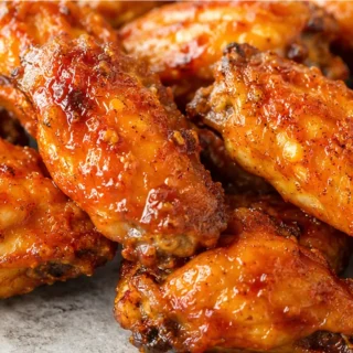 Crispy Keto Air Fryer Wings - keto chicken wings - Keto chicken wings: air fry crispy, flavorful wings in under 30 minutes. Toss with a tangy buffalo sauce for