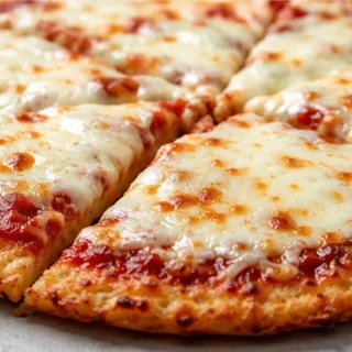 Keto Pizza: Crispy Crust, Zero Guilt! Keto pizza: bake this delicious low-carb pizza featuring a crispy almond flour crust. Perfect for a quick, satisfying meal